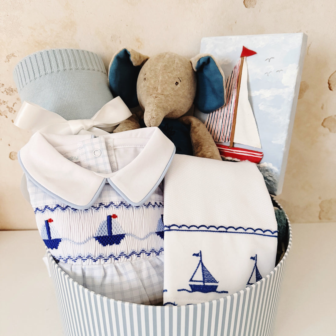 The Seaside Heirloom Baby Box – Pima Cotton Sailboat Footie, Organic Blanket, Elephant Toy &amp; Hand-Painted Canvas | Tuki Tuki Baby