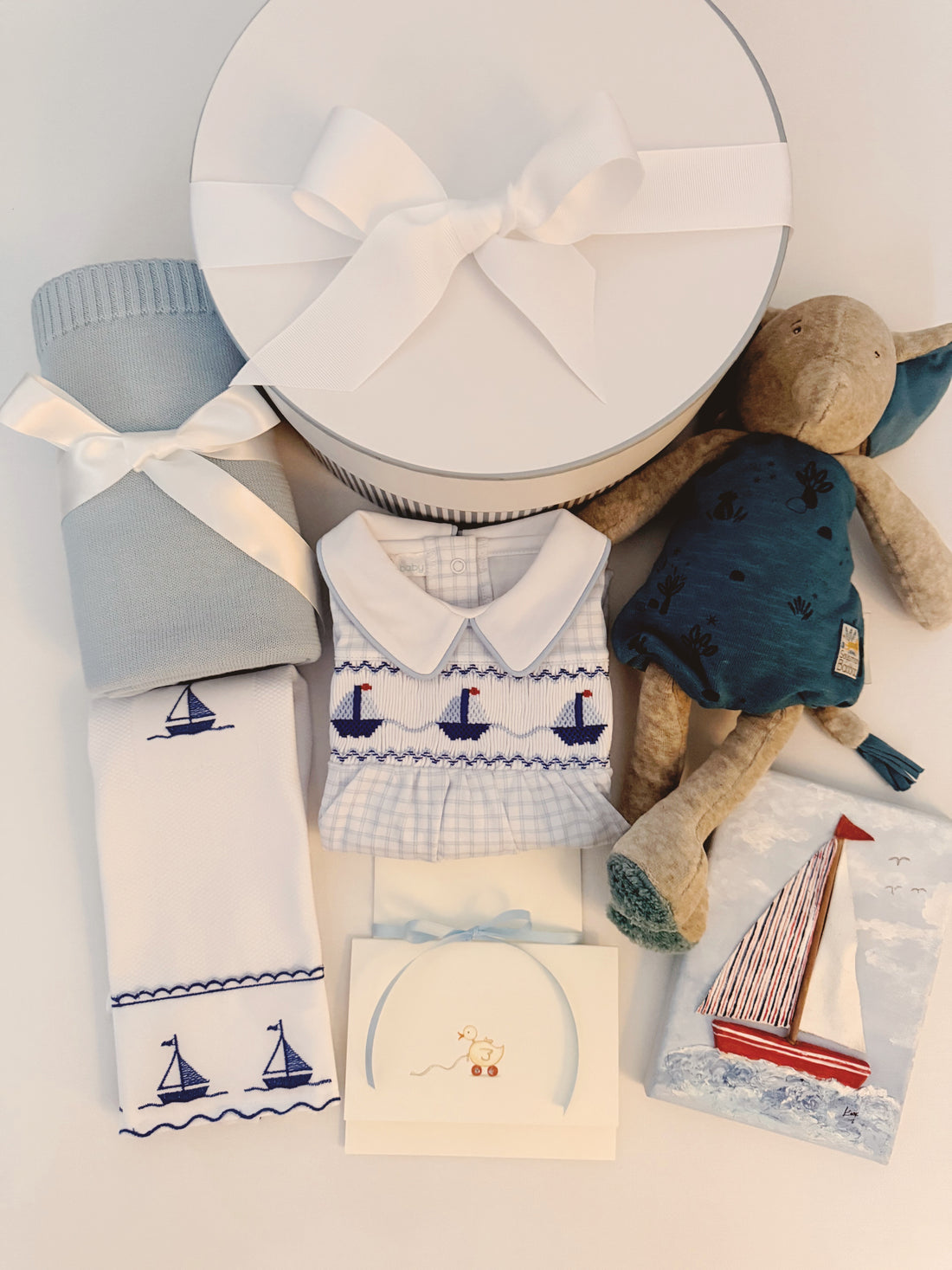 The Seaside Heirloom Baby Box – Pima Cotton Sailboat Footie, Organic Blanket, Elephant Toy &amp; Hand-Painted Canvas | Tuki Tuki Baby
