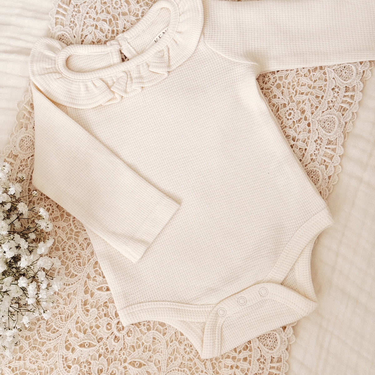 Waffle Knit Ruffle Onesie in Organic Cotton