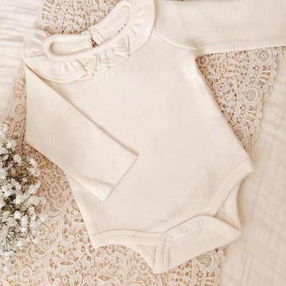 Waffle Knit Ruffle Onesie in Organic Cotton