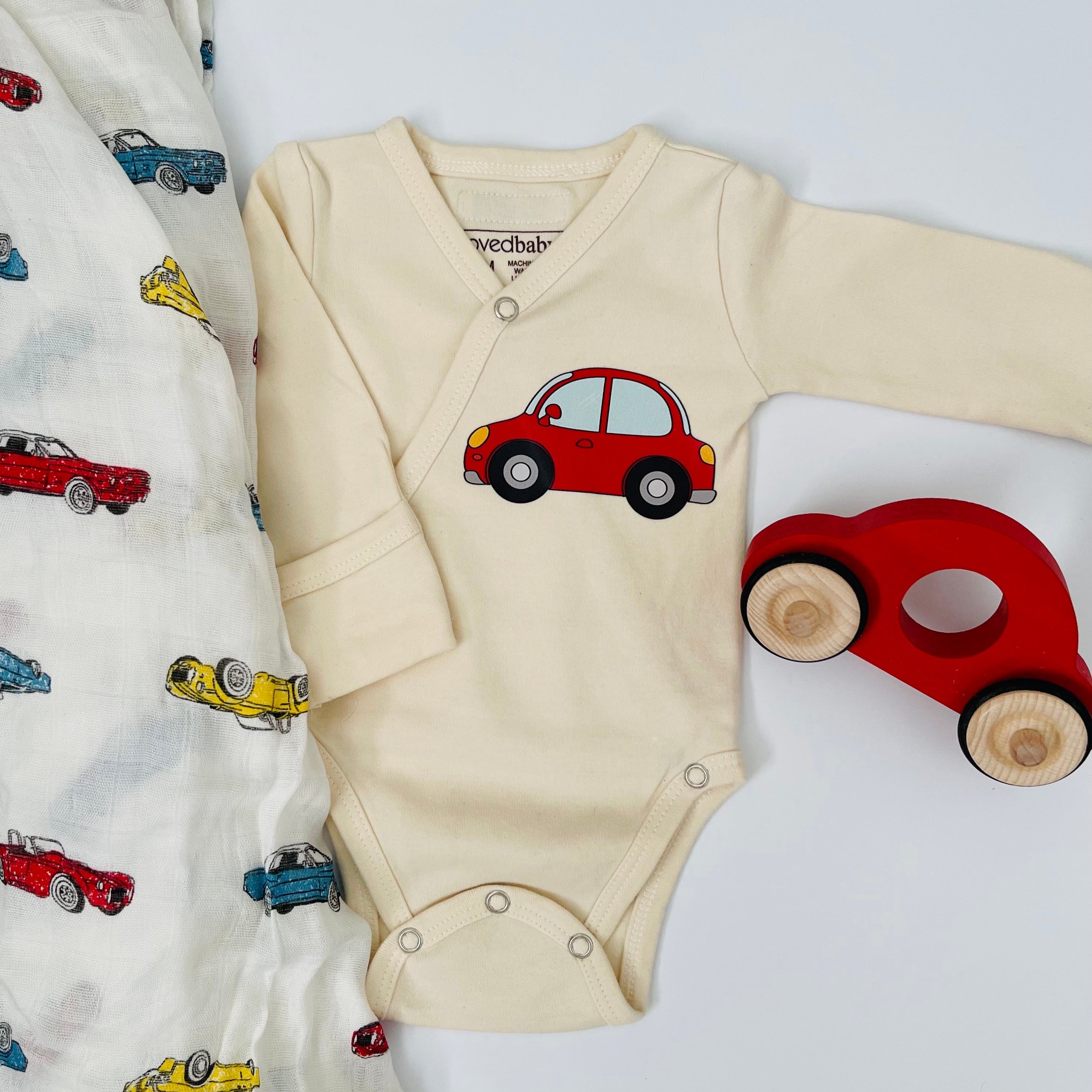 Ivory  Onesie With Red Car Design In Organic Cotton
